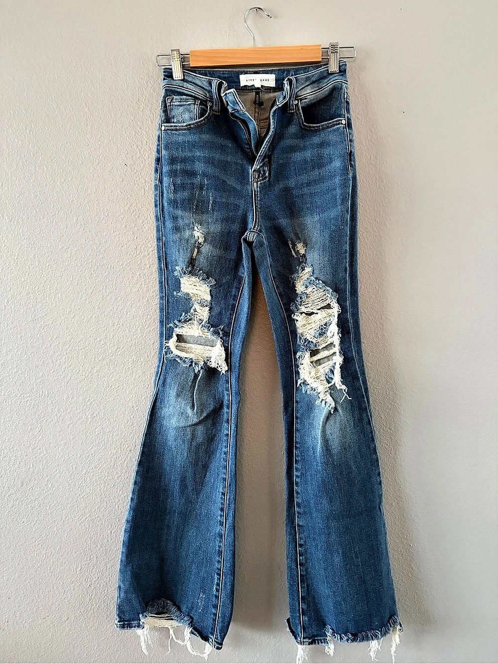 Risen Women's Distressed Flare Jeans in Blue